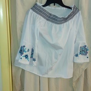 Whiteand blue off the shoulders top.